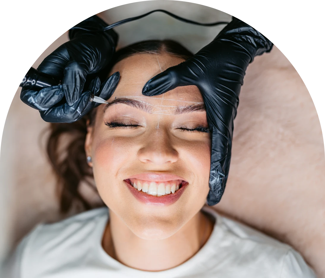 Woman getting eyebrow microblading procedure